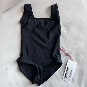 Child size 8 black Yumiko leotard. New with tags.